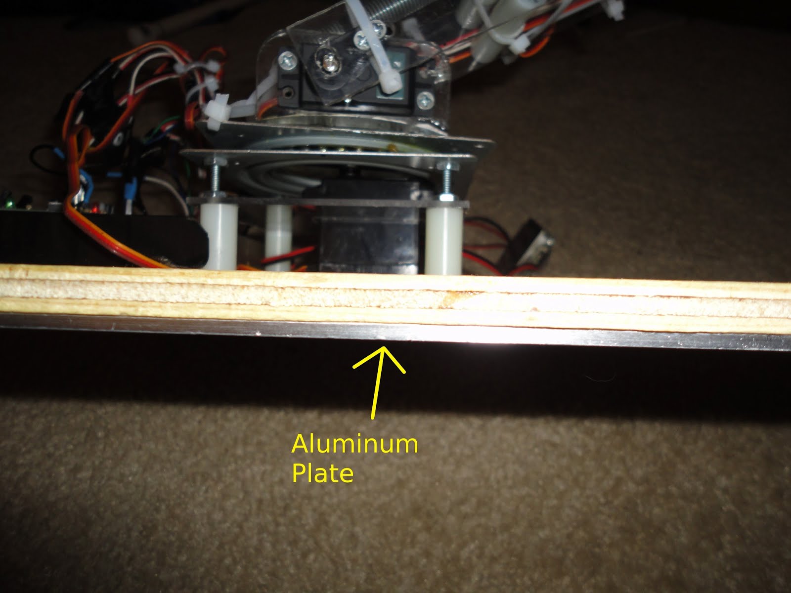 Robot arm base and lower joint assembly